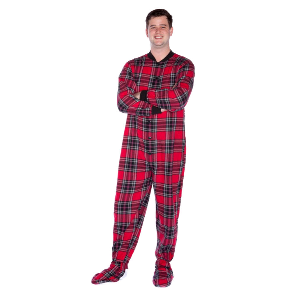 A man wearing Red and Black Plaid Adult Footed Onesie Pajamas from Big Feet Pajama Company