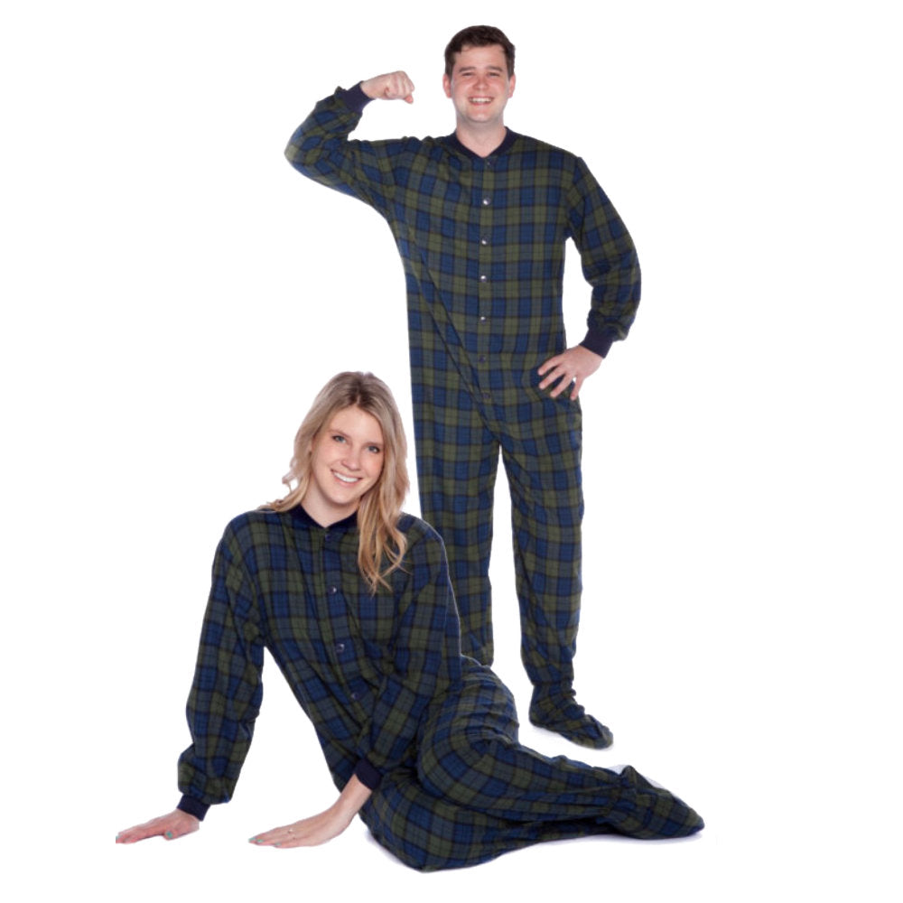 A man and a woman couple wearing Navy Blue and Green Plaid Adult Footed Onesie Pajamas from Big Feet Pajama Company