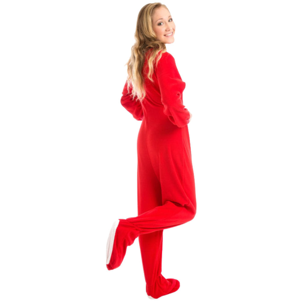 A woman wearing Red Fleece Adult Onesie Footed Pajamas from Big Feet Pajama Company.