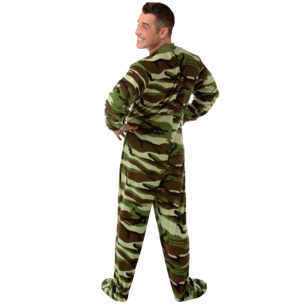 A man with hands on hips and looking back with a big smile wearing Camouflage Fleece Adult Onesie Footed Pajamas for Men from Big Feet Pajama Company