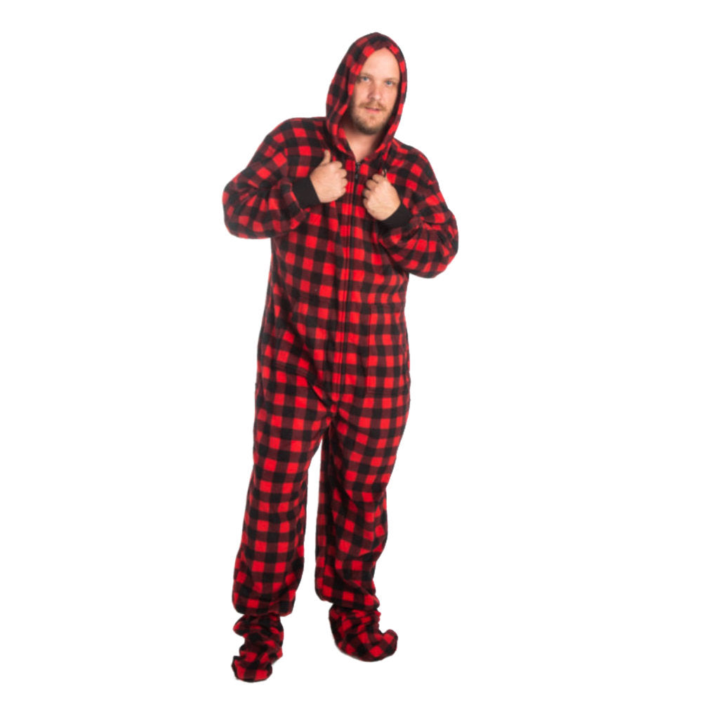 A man wearing Red and Black Buffalo Plaid Fleece Footed Onesie Pajamas from Big Feet Pajama Company