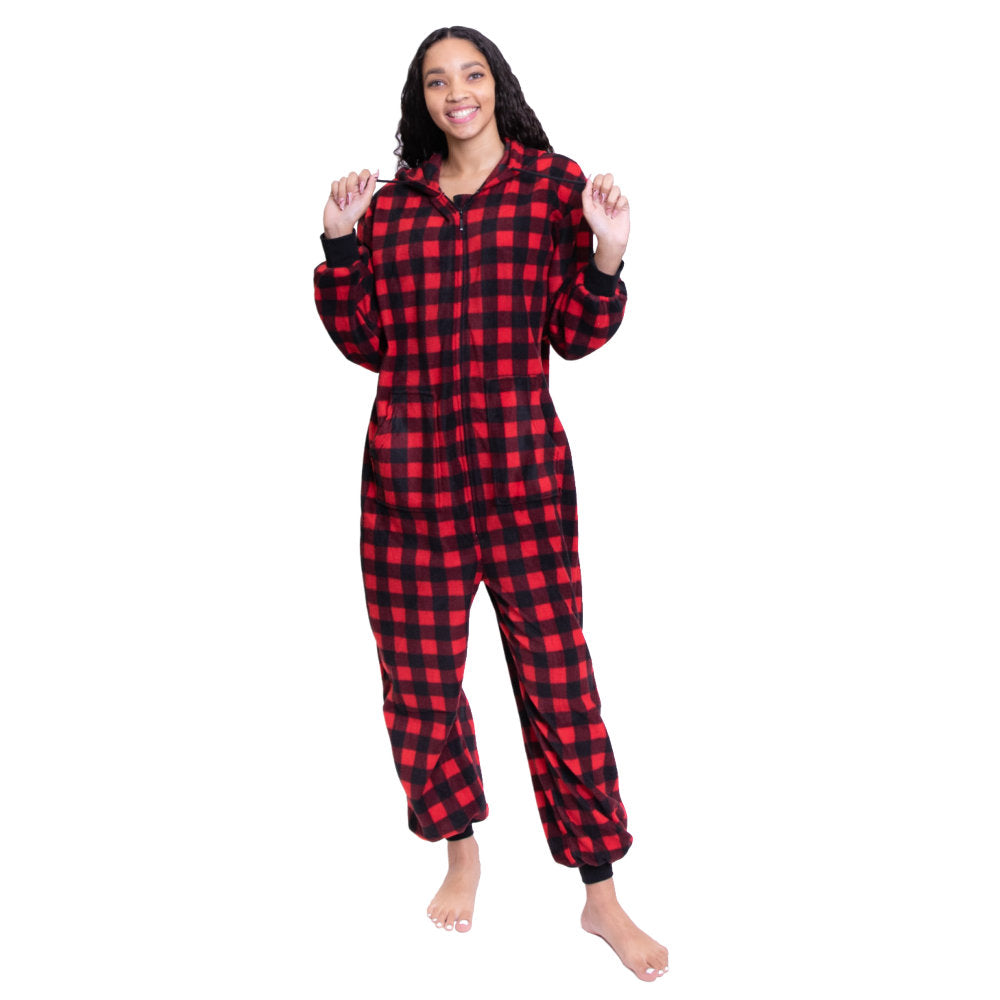A woman smiling, wearing Red & Black Buffalo Plaid Fleece Adult Onesie Hoodie Jumpsuit from Big Feet Pajama Company.