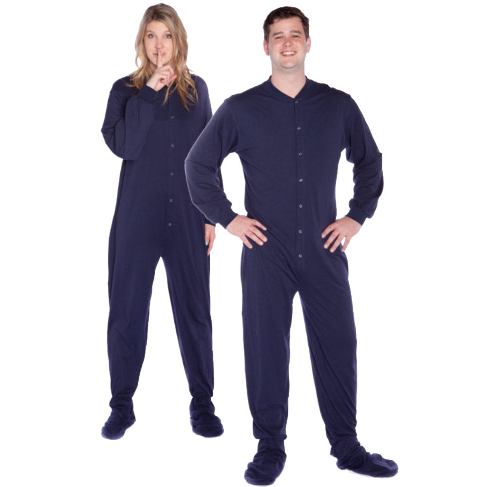 A couple having fun wearing matching Navy Blue Cotton Knit Adult Onesie Footed Pajamas for Men & Women from Big Feet Pajamas.