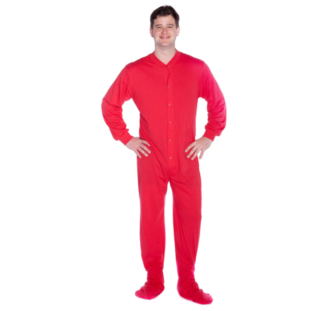 A man wearing Red Cotton Knit Adult Unisex Onesie Footed Pajamas for Men & Women from Big Feet Pajama Company.