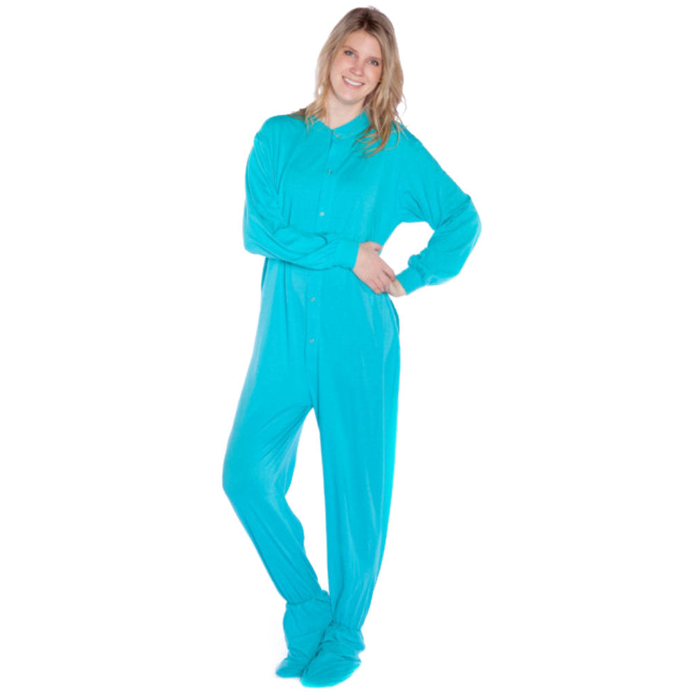 A woman wearing Turquoise Cotton Knit Adult Onesie Footed Pajamas for Men & Women from Big Feet Pajama Company.