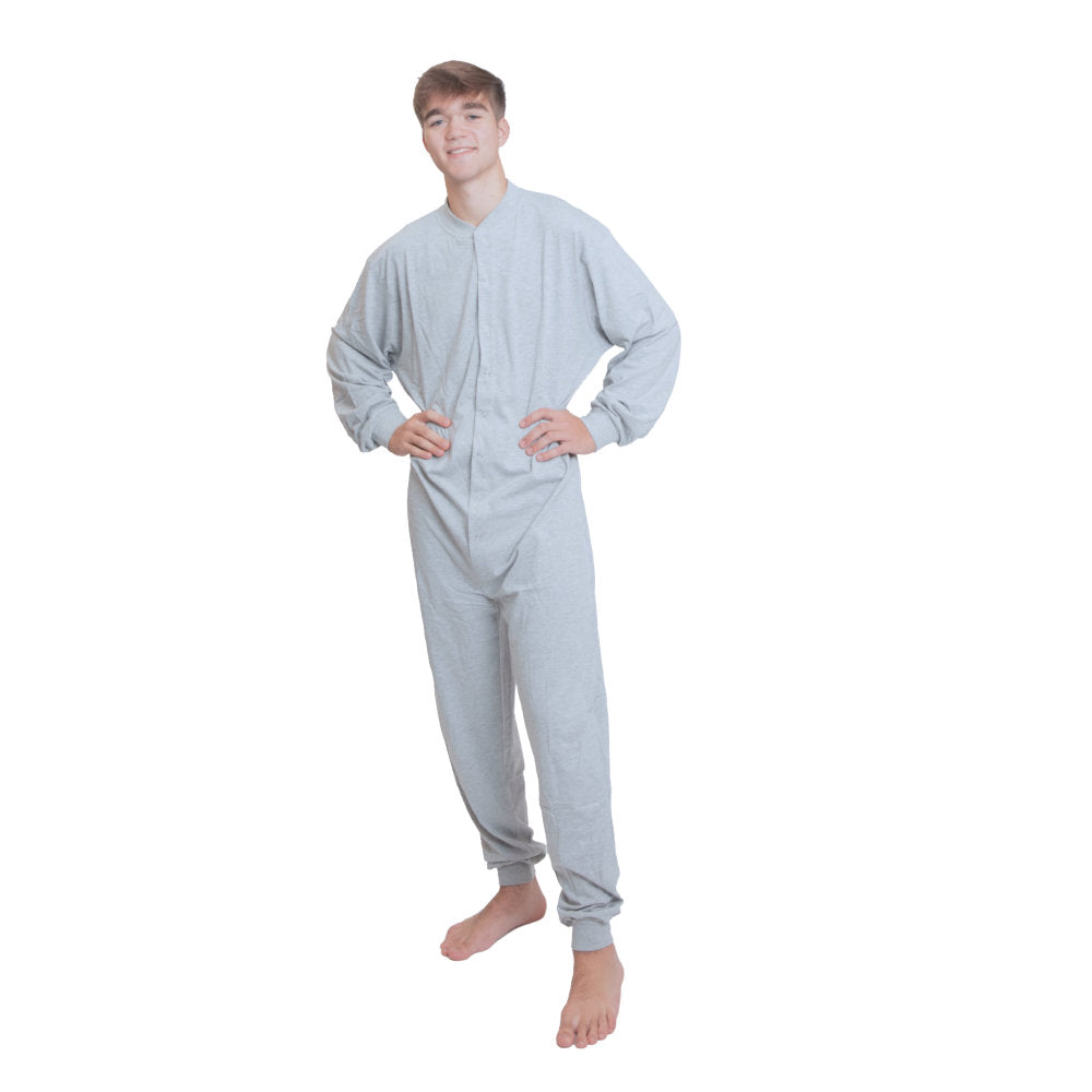 A man wearing Heather Gray Cotton Knit Adult Footless Onesie Pajamas for Men & Women from Big Feet Pajama Company.