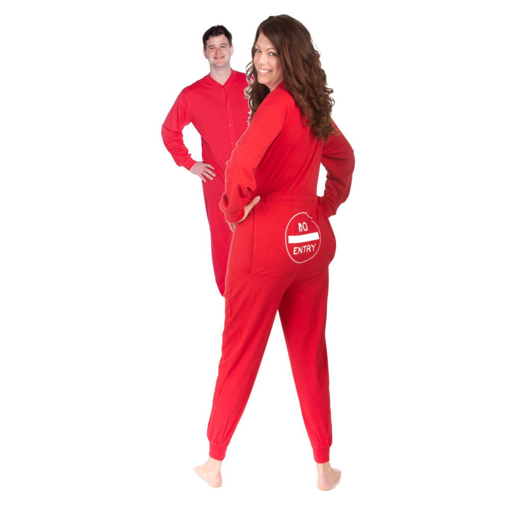A couple wearing matching Red Cotton Knit Adult Footless Onesie Pajamas with Funny Butt-Flap - sign says No Entry