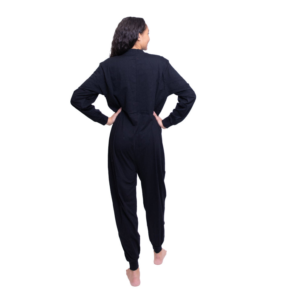 A woman showing you the back of her Black Cotton Knit Adult Footless Union Suit style Onesie Unisex Pajamas from Big Feet Pajama Company.
