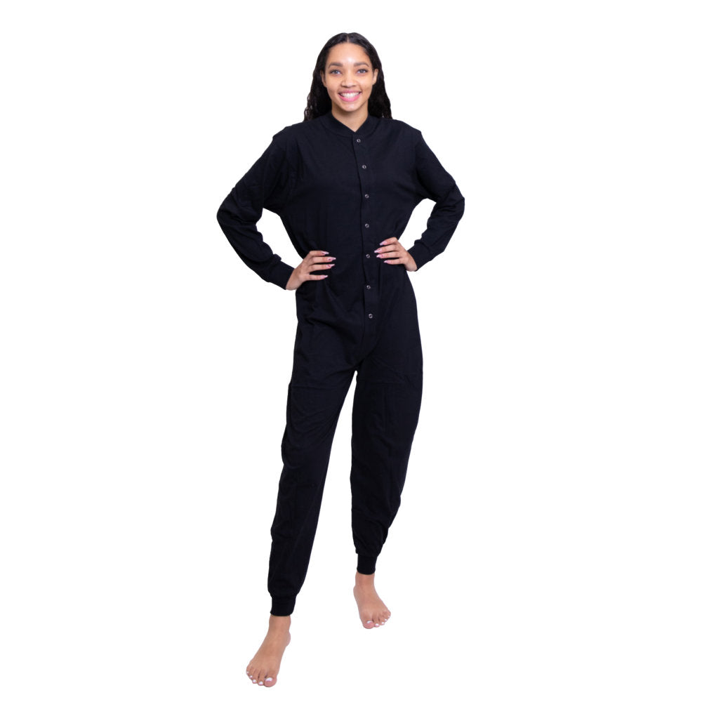 A woman wearing Black Cotton Knit Adult Footless Union Suit style Onesie Pajamas for Men and women from Big Feet Pajama Company.