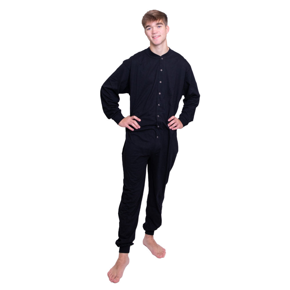 A man wearing Black Cotton Knit Adult Footless Union suit-style Onesie Pajamas for Men and women from Big Feet Pajama Company.