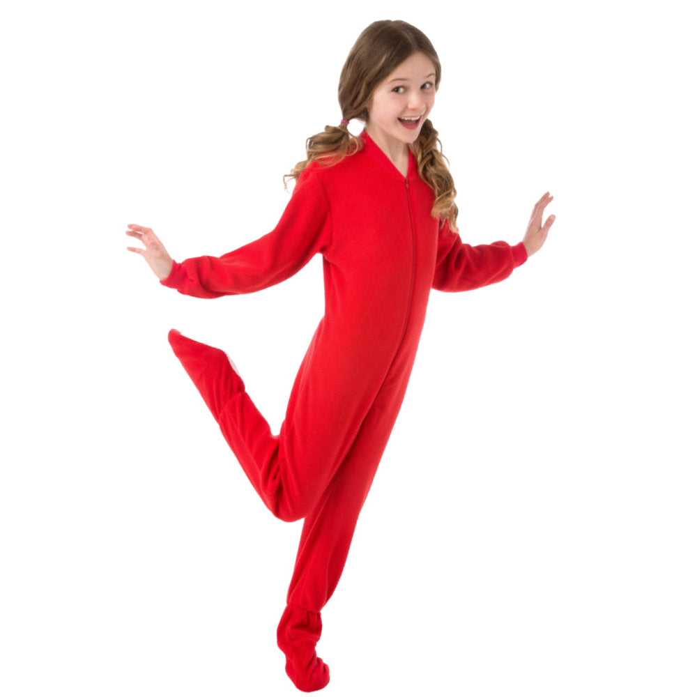 A girl dancing in her Red Fleece Onesie Footed Pajamas from Big Feet Pajama Company.