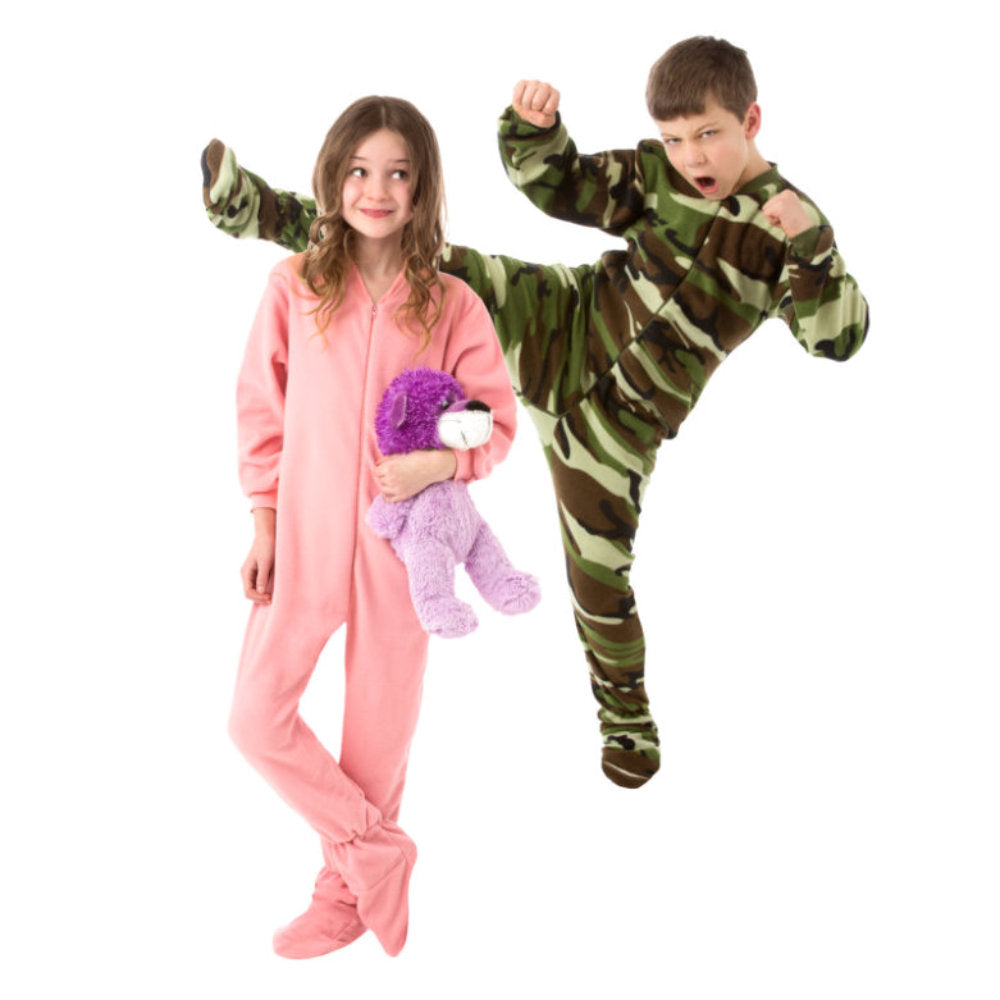 A little girl and her brother in their new Easter gifts, his camouflage and her Pastel Pink Fleece Onesie Footie Pajamas for kids from Big Feet Pajama Company.