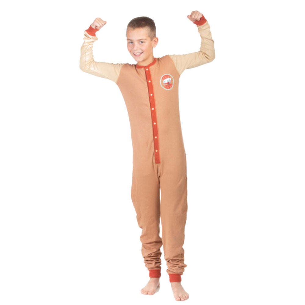 A very happy boy wearing a brown and beige Happy Camper onesie from the Big Feet Pajama collection of 100% cotton Union Suit Sleepwear and Playwear. The onesies feature a "Happy Camper" badge on the chest. These onesies have long sleeves, cuffs, a snap-up front, and a decorative rear flap with the Happy Camper Bear and Moose by the fire at their campsite.