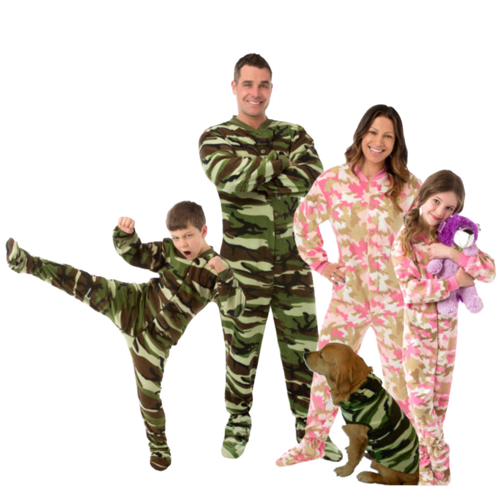 The entire family is wearing Matching Pajamas for their Christmas Card pictures. All in camouflage, Green Camo for dad, his son, and the dog too.
Mom and daughter wearing Pink Camouflage, all are Fleece Onesie Footed Pajamas from Big Feet Pajama Company.
