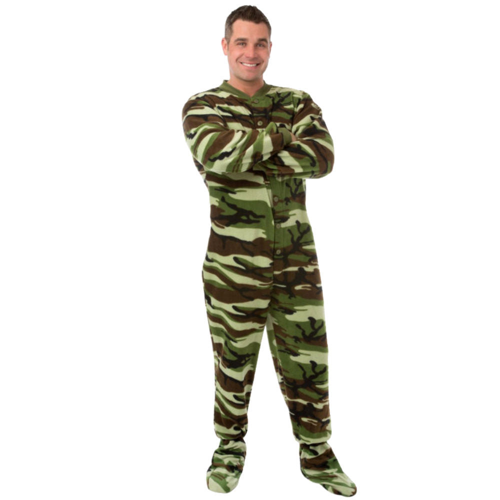 A man smiling with arms crossed wearing Camouflage Fleece Adult Onesie Footed Pajamas for Men from Big Feet Pajama Company