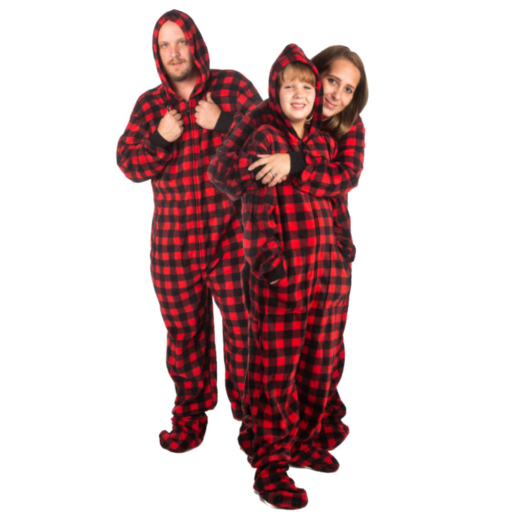 A man a woman with their daughter  wearing Family Matching Red and Black Buffalo Plaid Footed Onesie Pajamas from Big Feet Pajama Company
