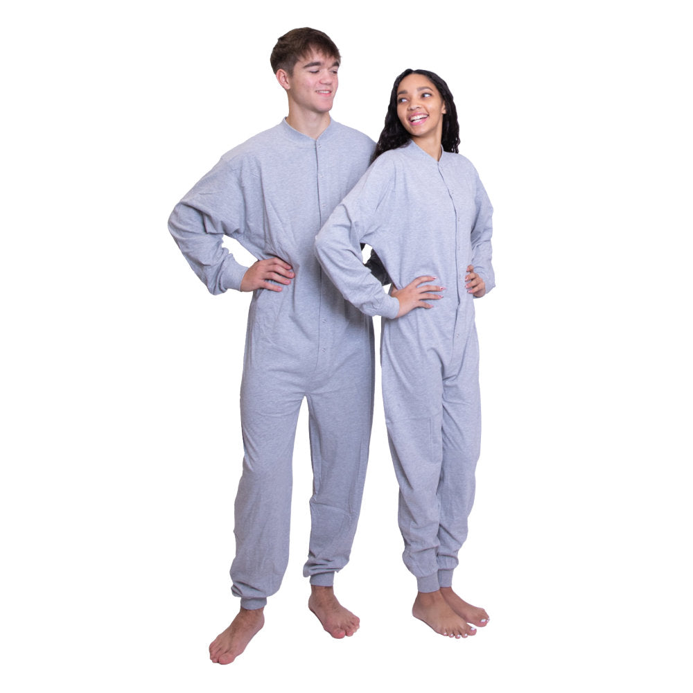 A couple wearing matching Heather Gray Cotton Knit Adult Footless Onesie Pajamas for Men & Women from Big Feet Pajama Company.