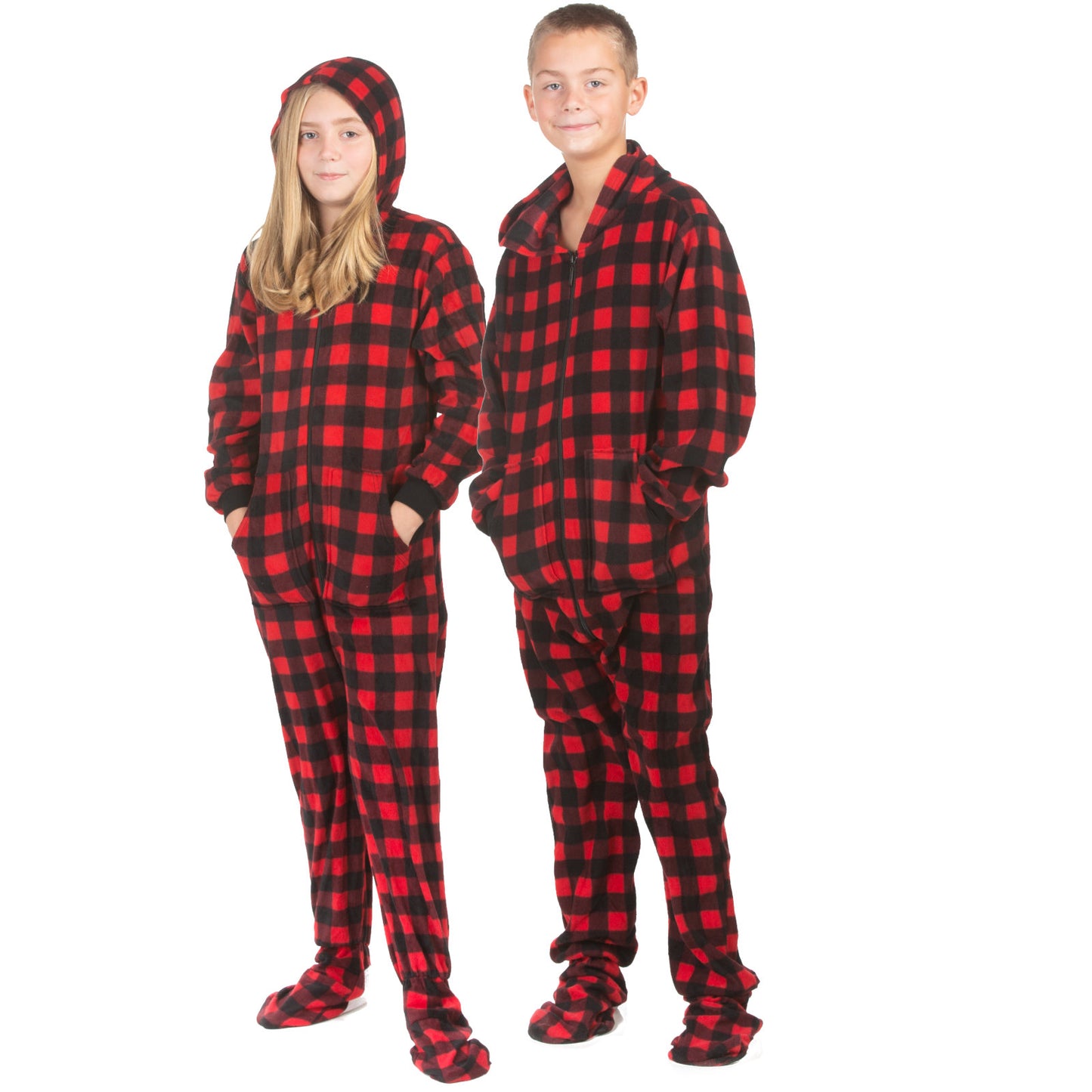 A sister and brother wearing matching pajamas for Christmas pictures; Hoodie Red & Black Buffalo Plaid Fleece Footed Onesie Pajamas from Big Feet Pajama Company.