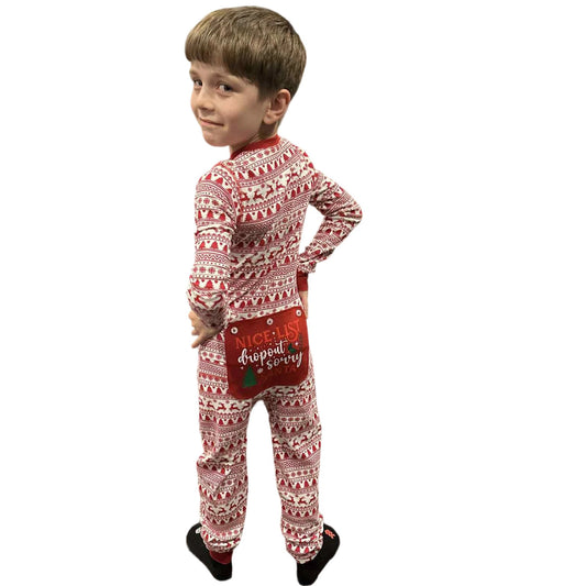Child wearing a red and white fair isle print onesie pajama with a red rear flap that reads, "Nice-List Dropout. Sorry Santa"  from the Big Feet Pajama Christmas Onesie Collection